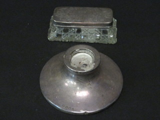 A circular silver capstan inkwell, lid f, Birmingham 1925 together with a rectangular cut glass dressing table jar with silver  lid