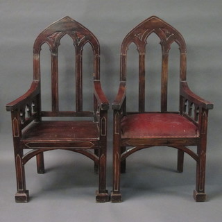 A pair of hardwood Gothic style throne chairs