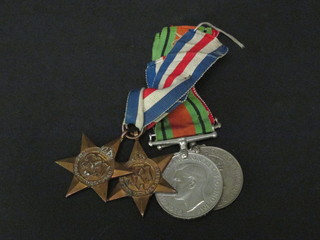 A group of 5 medals comprising 2 1939-45 Stars 1 named V M J Jatasker T/14641451, Defence medal and British War medal