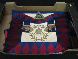 A quantity of various Masonic regalia comprising Royal Arch Supreme Grand Officer's Apron - standard bearer, London Grand  Chapter Officer's apron, Provincial Grand Officer's apron,  Sussex Deputy Registrar and 2 sashes