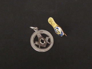 A silver Masonic watch chain charm together with a gilt metal  and enamel brooch in the form of a slipper