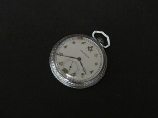 A Waltham Masonic open faced pocket watch contained in a  white metal case