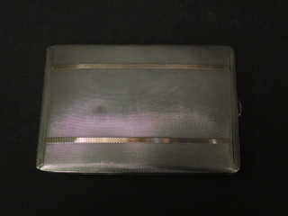 A silver cigarette case with engine turned decoration  Birmingham 1936 4 ozs