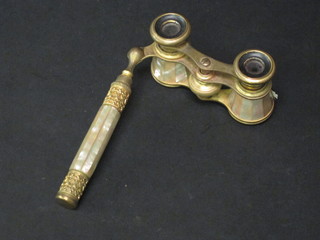 A pair of Continental gilt metal and mother of pearl opera glasses