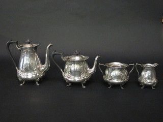 An oval embossed silver plated 4 piece tea/coffee service comprising teapot, coffee pot, twin handled sugar bowl and  cream jug, by Mappin & Webb