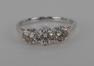 A lady's 18ct white gold dress ring set 3 circular cut diamonds, approx. 0.98ct