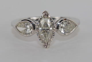 A lady's 18ct white gold dress ring set a marquise cut diamond and with 2 tear cut diamonds to the shoulders, approx.  1.58ct