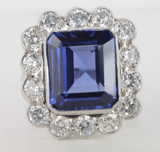 A lady's 18ct white gold dress ring set a square cut tanzanite  approx 10.20ct surrounded by diamonds, approx 2.20ct  ILLUSTRATED