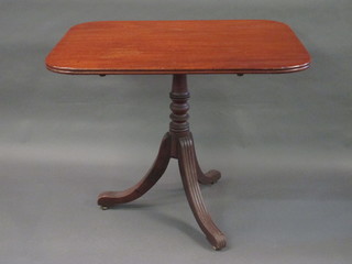 A rectangular 19th Century snap top breakfast table, raised on  pillar and tripod supports 36"