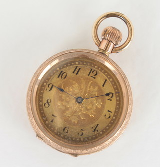 A lady's open faced fob watch contained in a 14ct gold case