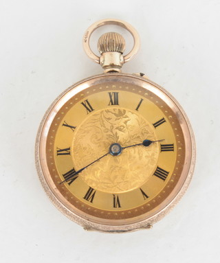 A fob watch contained in a 9ct gold chased case