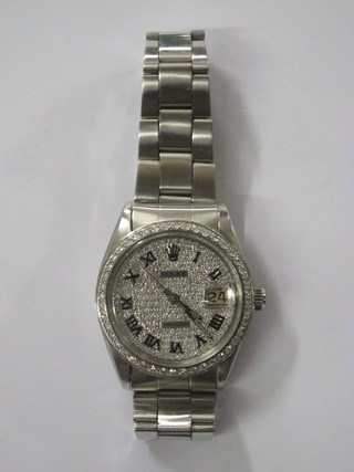 A gentleman's Rolex Precision wristwatch contained in a stainless steel case, the dial and bezel set diamonds   ILLUSTRATED
