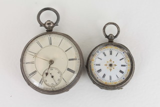 An open faced pocket watch contained in a silver case together with a fob watch