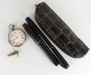 An open faced fob watch by Samuels contained in a silver case  and a cased set of 2 fountain pens