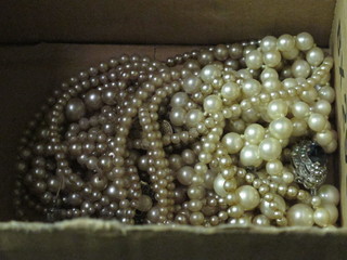 A quantity of simulated pearl necklaces