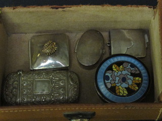 A circular silver and enamel compact with hinged lid 1", a silver stamp case, an Eastern silver vinaigrette and 2 silver pill boxes