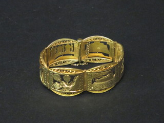 A pierced gilt metal bracelet