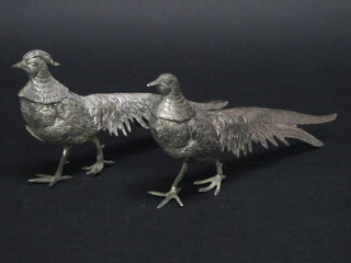 A pair of silver plated table ornaments in the form of pheasants  12"