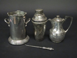 A silver plated twin handled soda siphon holder, a silver plated cocktail shaker and a hotwater jug