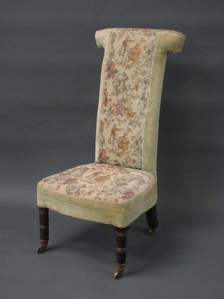 A Victorian ebonised Pre-Dieu chair, the seat and back  upholstered in tapestry material