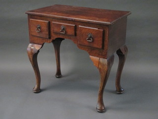 A 19th Century walnut low boy with cross-banded top fitted 1  long and 2 short drawers, raised on cabriole supports 30"