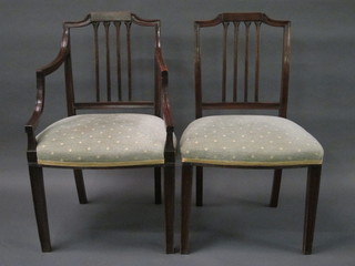 A set of 6 Georgian style mahogany stick and rail back dining  chairs with upholstered drop in seats, raised on square tapering  supports - 2 carvers, 4 standard