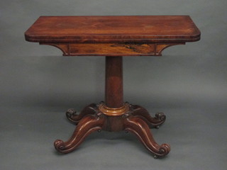 A William IV rosewood D shaped Tea table raised on a turned  column and tripod base 36"  ILLUSTRATED