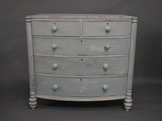 A Georgian lilac painted bow front chest of 2 short and 3 long drawers with tore handles, raised on bun feet, 44"