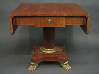 A Continental mahogany pedestal sofa table raised on a turned column with triform base and paw feet 32"  ILLUSTRATED