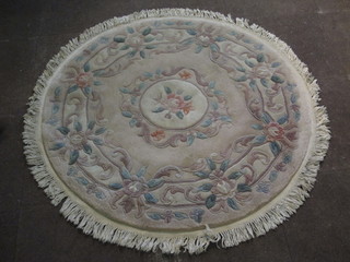 A grey ground and floral patterned circular Chinese rug 49"