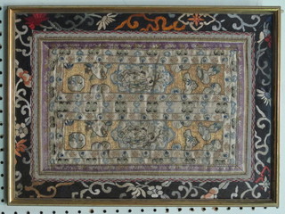 An Oriental embroidered panel depicting figures 15" x 10 1/2"