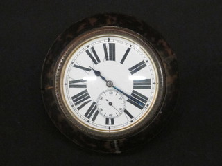 A 19th Century travelling clock with amber dial and Roman numerals, contained in a tortoiseshell case 3 1/2"