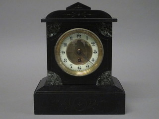 A Victorian French 8 day mantel clock with Arabic numerals  contained in a black marble case