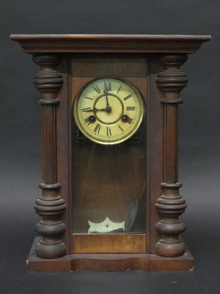A Vienna style striking regulator with 4" paper dial contained in  a walnut case