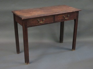 A 19th Century oak side table fitted 2 drawers with brass drop handles, raised on square supports, 36"