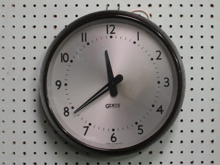 An electric wall clock with silvered dial and Arabic numerals by Gents of Leicester 9"