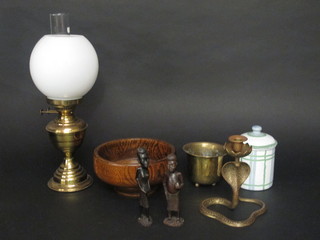 A turned oak fruit bowl, a turned oak and chrome mounted  biscuit barrel, an oil lamp, various Continental enamelled storage  jars and other items of metalware