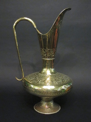 A large embossed brass ewer 26"