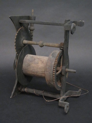 An 18th/19th Century iron and wooden spit bit turner