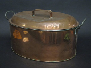 An oval twin handled copper saucepan 18"