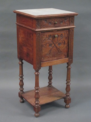 A square French carved oak bedside table with white veined  marble top fitted a drawer above a cupboard, raised on turned  and block supports with undertier, 16"