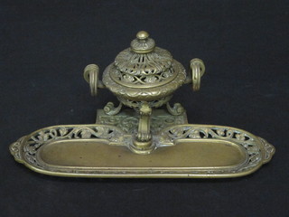 A handsome 19th Century pierced gilt metal standish with pen receptical and inkwell 11"