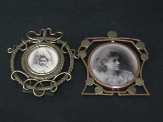 An ornate circular gilt metal easel photograph frame 4" and an  Art Nouveau copper and brass easel photograph frame