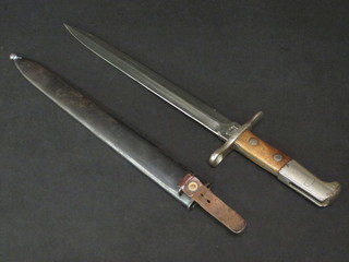 A Continental double edge bayonet the 12" blade marked Waffenfabrik Nechausen complete with metal scabbard