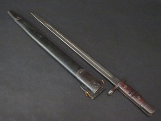 A 1917 American Remmington bayonet complete with scabbard