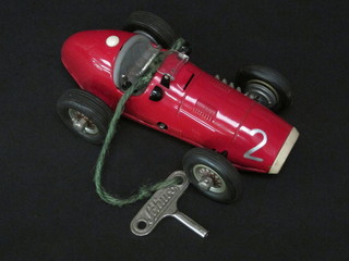 A Schuco clockwork racing car, the base marked 1070 Grand  Prix Racer