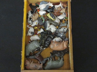 A collection of various Britains metal farmyard animals
