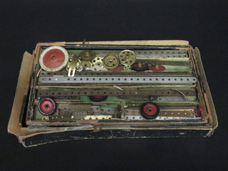 2 shallow trays containing a collection of Meccano