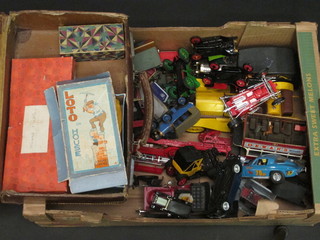 An attache case containing various childrens games and a collection of toy cars