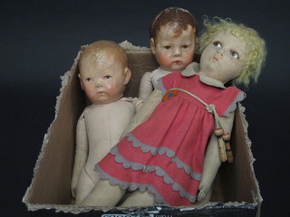 A felt doll and 2 fabric bodied dolls